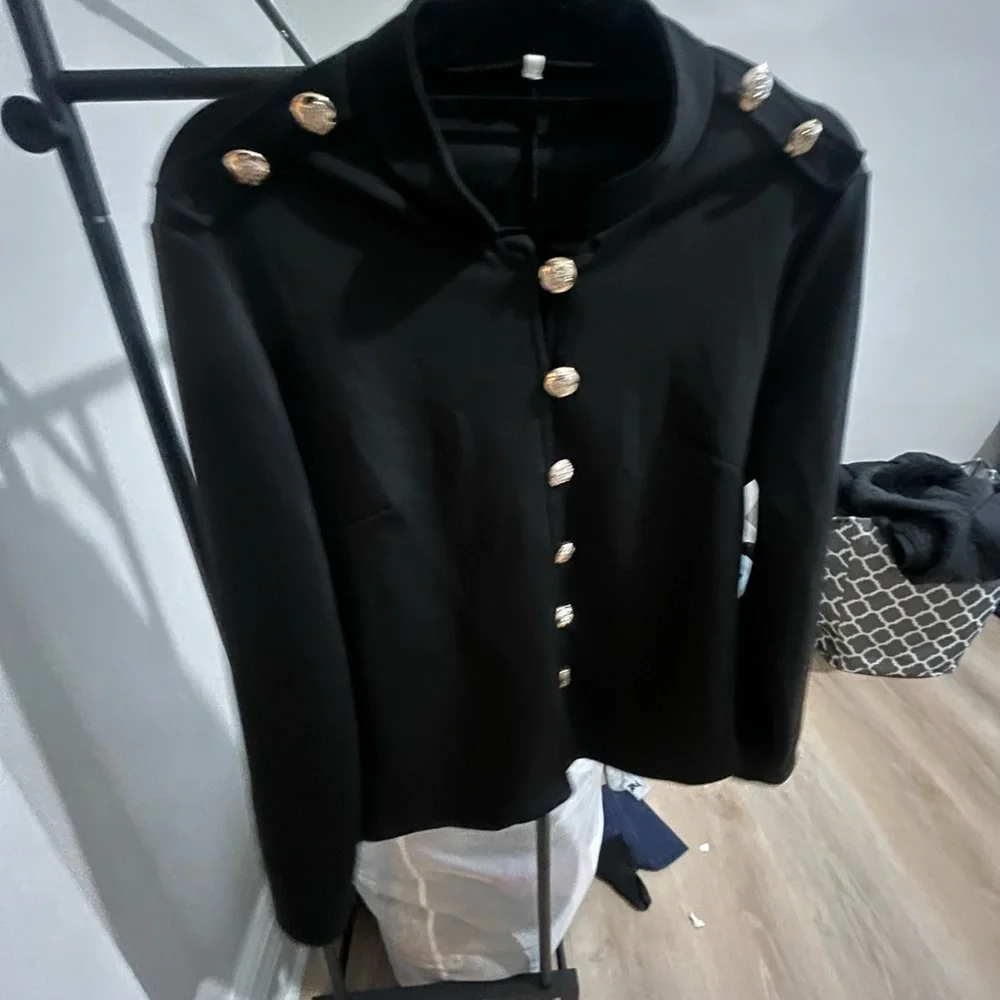 Chic Black Jacket with Gold Accents